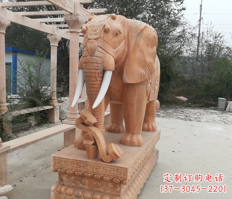 吉林鼻卷如意的大象晚霞红门口镇宅石雕