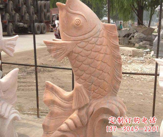 吉林公园景观晚霞红石雕鱼喷泉