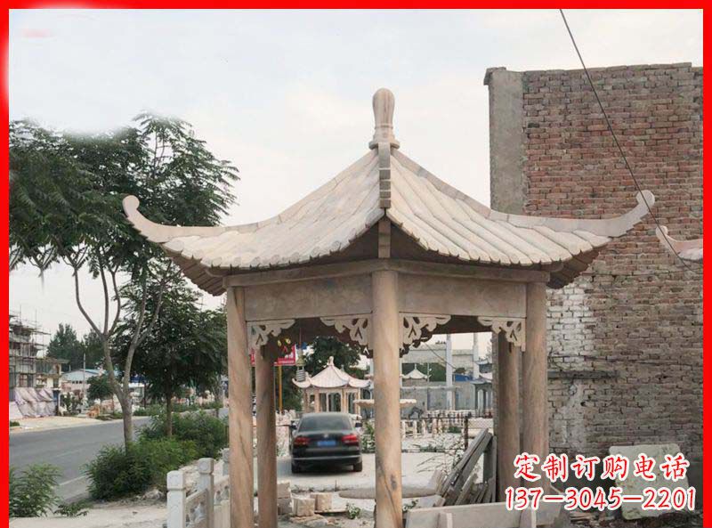 吉林公园晚霞红六角石凉亭雕塑