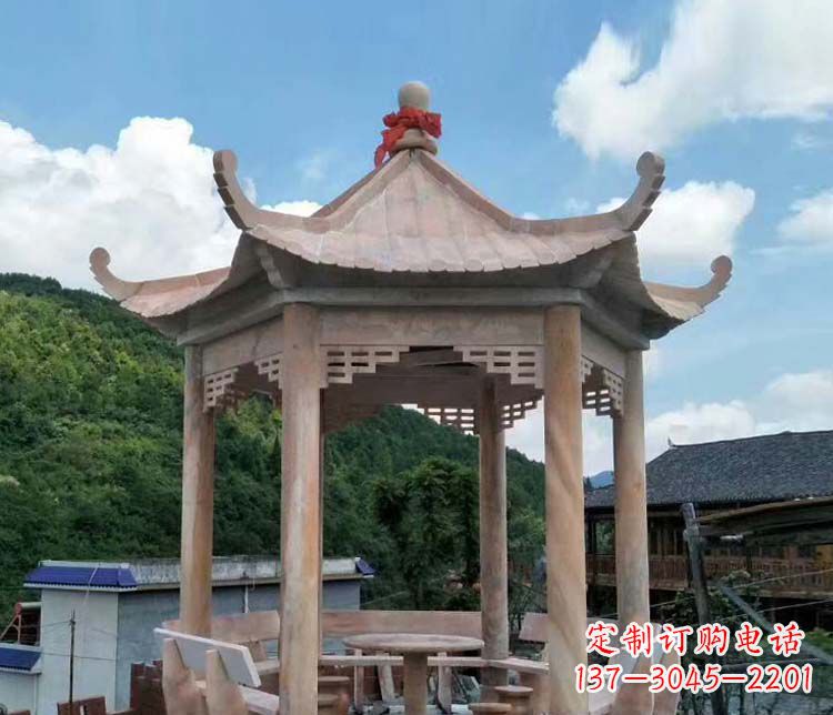 吉林一流的公园晚霞红六角石雕凉亭