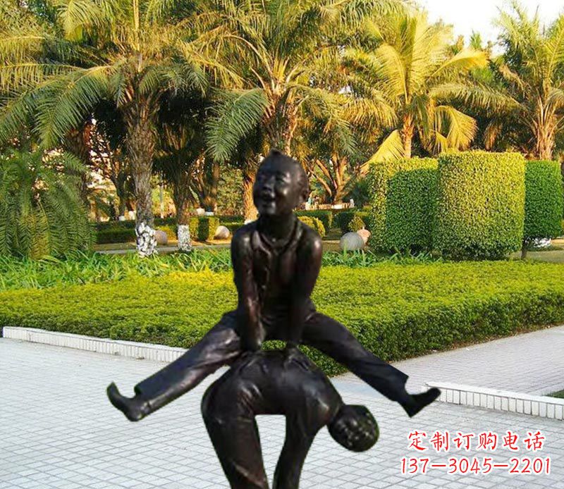 吉林跳山羊的儿童铜雕