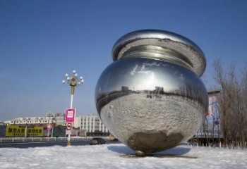 吉林陀螺雕塑-户外广场大型景观不锈钢镜面陀螺雕塑
